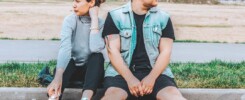 couple sitting apart thinking