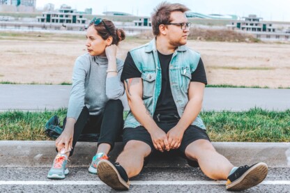 couple sitting apart thinking